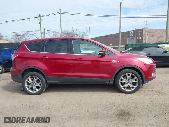 2013 Ford Escape SEL with VIN 1FMCU9H9XDUA81463, listed as a IAAI auction lot 41991257 with 102,867 mi miles and . Bid and sale history available at DreamBid. Image 14.