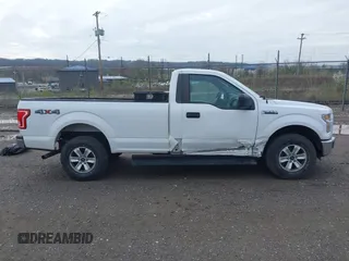 2016 Ford F-150 XL with VIN 1FTMF1EF4GKE09829, listed as a IAAI auction lot 41947402 with 124,150 mi miles and . Bid and sale history available at DreamBid. Image 14.