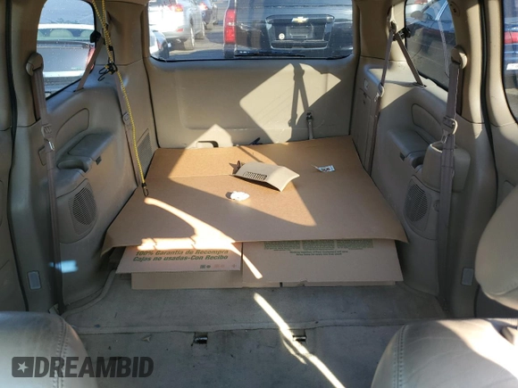 2002 Toyota Sienna LE with VIN 4T3ZF13C52U458553, listed as a Copart auction lot 77957754 with 164,058 mi miles and Salvage Title. Bid and sale history available at carsss.com. Image 10.