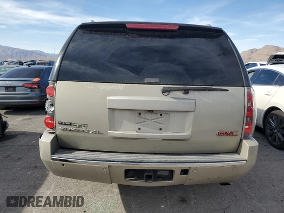 2009 GMC Yukon XL z VIN 1GKFC06279R255624, wystawiony jako Copart lot #49852455 z przebiegiem 236 322 mil mil oraz Szkoda całkowita • Salvage title. Historia ofert i sprzedaży dostępna na DreamBid. Obrazek 6.