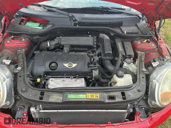 2010 MINI Hardtop with VIN WMWMF3C55ATZ24438, listed as a Copart auction lot 56395435 with Not Provided miles and Clean Title. Bid and sale history available at DreamBid. Image 7.
