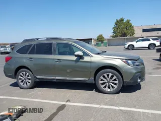 2019 Subaru Outback Touring with VIN 4S4BSATC8K3245981, listed as a IAAI auction lot 42508408 with 58,173 mi miles and . Bid and sale history available at DreamBid. Image 13.