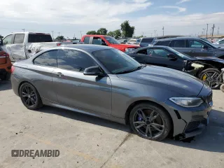 2016 BMW 2 Series M235i with VIN WBA1J7C52GV359958, listed as a Copart auction lot 65937374 with 82,231 mi miles and Salvage title. Bid and sale history available at DreamBid. Image 4.