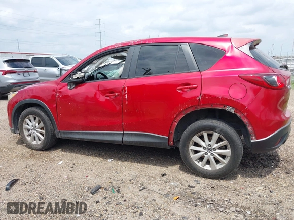 2016 Mazda CX-5 Sport with VIN JM3KE2BYXG0668401, listed as a IAAI auction lot 42370910 with Not provided miles and . Bid and sale history available at DreamBid. Image 15.