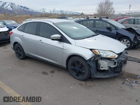 2013 Ford Focus SE with VIN 1FADP3F20DL361469, listed as a IAAI auction lot 41457037 with 127,852 mi miles. Bid and sale history available at carsss.com. Image 1.