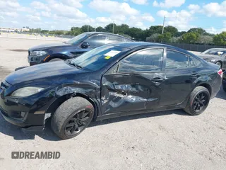 2009 Mazda 6 S Grand Touring with VIN 1YVHP82BX95M21939, listed as a IAAI auction lot 41527269 with 154,544 mi miles and . Bid and sale history available at DreamBid. Image 6.