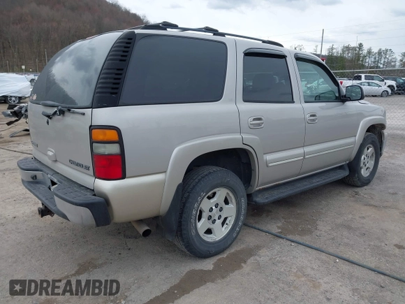 2004 Chevrolet Tahoe LS with VIN 1GNEK13Z74J181914, listed as a IAAI auction lot 41881310 with 213,223 mi miles. Bid and sale history available at carsss.com. Image 4.