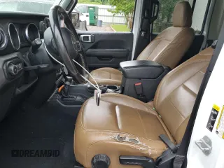 2020 Jeep Wrangler Unlimited Sahara with VIN 1C4HJXEG4LW272051, listed as a Copart auction lot 61090665 with 100,148 mi miles and Clean title. Bid and sale history available at DreamBid. Image 7.