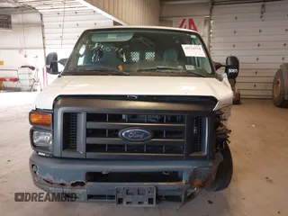 2012 Ford Econoline Cargo Commercial with VIN 1FTNE1EW1CDA97975, listed as a IAAI auction lot 41552574 with 54,665 mi miles and . Bid and sale history available at DreamBid. Image 12.