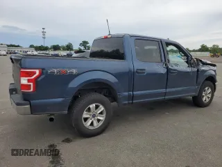 2019 Ford F-150 XL with VIN 1FTEW1E55KFC10642, listed as a Copart auction lot 62811755 with 128,286 mi miles and Salvage title. Bid and sale history available at DreamBid. Image 3.