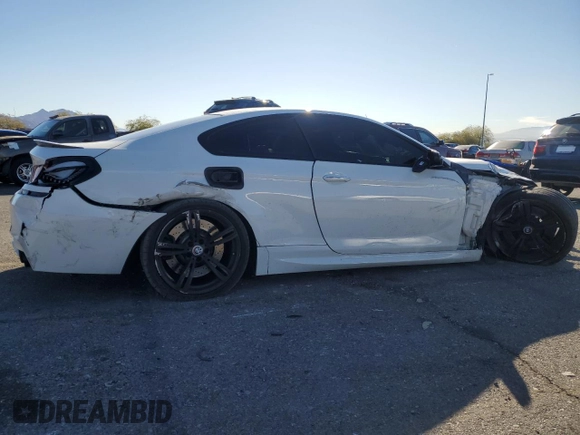 2015 BMW M6 z VIN WBSLX9C54FD160753, wystawiony jako Copart lot #83486484 z przebiegiem 80 275 mil mil oraz Szkody całkowita. Historia ofert i sprzedaży dostępna na DreamBid. Obrazek 3.