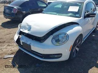 2012 Volkswagen Beetle with VIN 3VWV87AT1CM627756, listed as a IAAI auction lot 41657307 with 81,924 mi miles and . Bid and sale history available at DreamBid. Image 6.