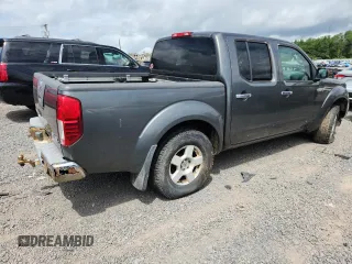 2006 Nissan Frontier LE z VIN 1N6AD07W96C402929, wystawiony jako Copart lot #63877945 z przebiegiem 170 375 mil mil oraz Czysty tytuł • Clean title. Historia ofert i sprzedaży dostępna na DreamBid. Obrazek 3.