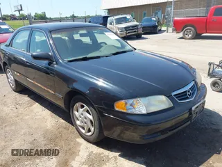 2002 Mazda 626 LX z VIN 1YVGF22D025285064, wystawiony jako IAAI lot #42522044 z przebiegiem 184 047 mil mil oraz . Historia ofert i sprzedaży dostępna na DreamBid. Obrazek 1.