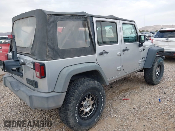 2008 Jeep Wrangler Unlimited X with VIN 1J4GA39198L651172, listed as a IAAI auction lot 41936521 with 69,007 mi miles and . Bid and sale history available at DreamBid. Image 4.