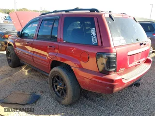 2004 Jeep Grand Cherokee Limited with VIN 1J4GW58N34C124515, listed as a IAAI auction lot 40602071 with 169,358 mi miles. Bid and sale history available at carsss.com. Image 3.