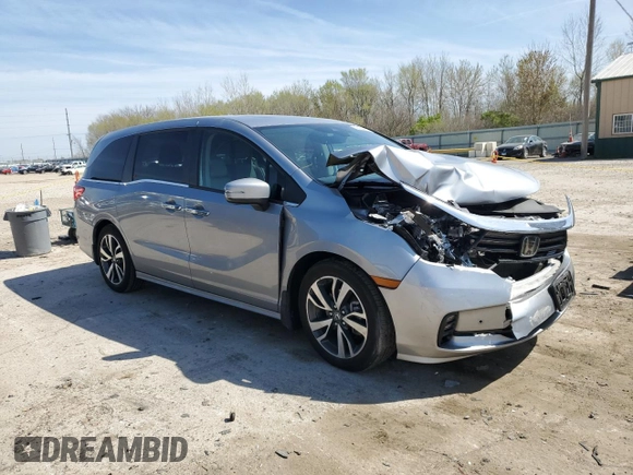 2023 Honda Odyssey Touring with VIN 5FNRL6H8XPB043493, listed as a Copart auction lot 53166015 with 34,615 mi miles and Salvage Title. Bid and sale history available at DreamBid. Image 4.