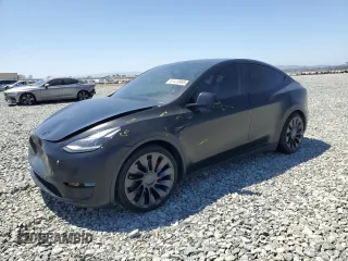 2022 Tesla Model Y Performance with VIN 7SAYGDEF8NF492954, listed as a Copart auction lot 61419965 with 24,885 mi miles and Salvage title. Bid and sale history available at DreamBid. Image 1.