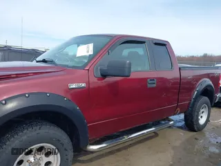 2005 Ford F-150 STX with VIN 1FTRX14W35FA49074, listed as a IAAI auction lot 41833989 with 267,664 mi miles. Bid and sale history available at carsss.com. Image 14.