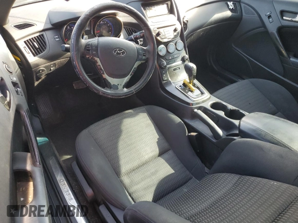 2013 Hyundai Genesis Coupe R-Spec z VIN KMHHT6KDXDU101716, wystawiony jako Copart lot #52415625 z przebiegiem 136 346 mil mil oraz Szkoda całkowita • Salvage title. Historia ofert i sprzedaży dostępna na DreamBid. Obrazek 8.