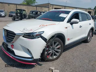 2020 Mazda CX-9 Grand Touring with VIN JM3TCBDY3L0410674, listed as a IAAI auction lot 42389157 with 130,519 mi miles and . Bid and sale history available at DreamBid. Image 20.