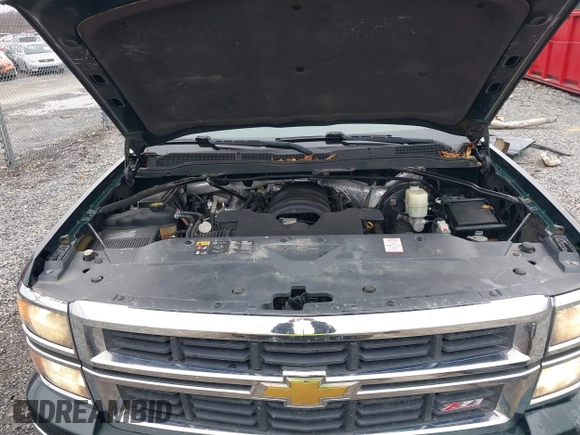 2014 Chevrolet Silverado 1500 LT with VIN 3GCUKREC1EG516826, listed as a IAAI auction lot 41119573 with 164,844 mi miles and . Bid and sale history available at DreamBid. Image 10.