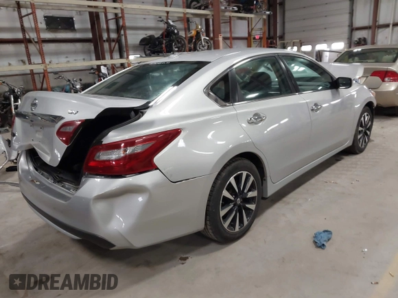 2018 Nissan Altima SR with VIN 1N4AL3AP0JC266584, listed as a IAAI auction lot 41900484 with 136,223 mi miles and . Bid and sale history available at carsss.com. Image 4.