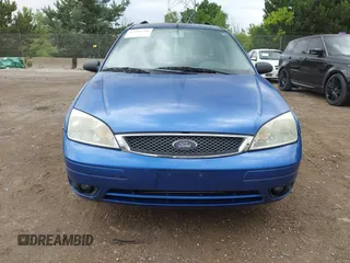 2005 Ford Focus SE with VIN 1FAFP36N05W193335, listed as a IAAI auction lot 42799768 with 110,627 mi miles and . Bid and sale history available at DreamBid. Image 6.