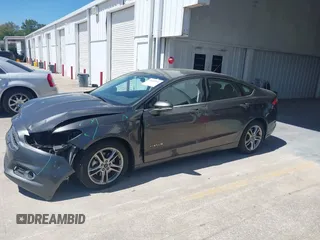 2016 Ford Fusion SE Hybrid with VIN 3FA6P0LU3GR127121, listed as a IAAI auction lot 41840795 with 88,281 mi miles. Bid and sale history available at carsss.com. Image 15.