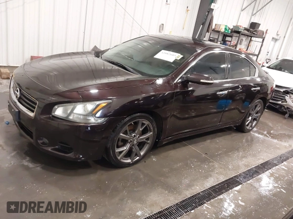 2014 Nissan Maxima SV z VIN 1N4AA5AP5EC910605, wystawiony jako IAAI lot #42082685 z przebiegiem 83 628 mil mil oraz . Historia ofert i sprzedaży dostępna na DreamBid. Obrazek 18.