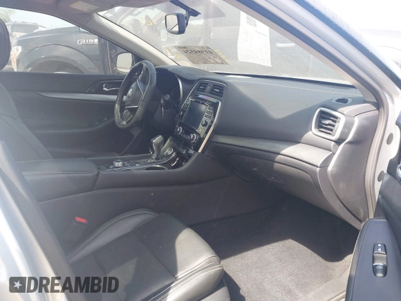 2018 Nissan Maxima S with VIN 1N4AA6AP0JC364148, listed as a IAAI auction lot 41984524 with 24,419 mi miles and . Bid and sale history available at DreamBid. Image 4.