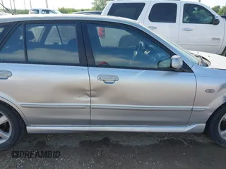 2003 Mazda Protege with VIN JM1BJ245031218333, listed as a IAAI auction lot 42070471 with 181,748 mi miles and . Bid and sale history available at DreamBid. Image 13.