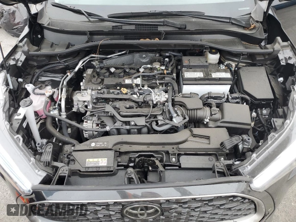 2024 Toyota Corolla Cross XLE with VIN 7MUDAAAG8RV095021, listed as a Copart auction lot 59232265 with 7,010 mi miles and Salvage title. Bid and sale history available at DreamBid. Image 12.