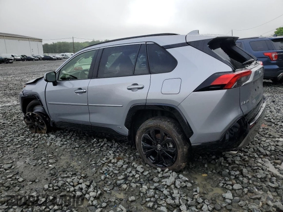 2023 Toyota RAV4 Hybrid SE with VIN JTM16RFV7PD100111, listed as a Copart auction lot 56682135 with 32,198 mi miles and Salvage title. Bid and sale history available at DreamBid. Image 2.