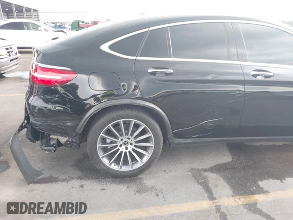 2019 Mercedes-Benz GLC 300 with VIN WDC0J4KB0KF667213, listed as a IAAI auction lot 40422288 with 56,488 mi miles and . Bid and sale history available at DreamBid. Image 6.