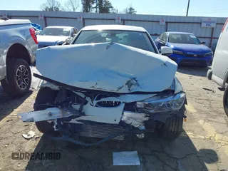 2013 BMW 3 Series 320i with VIN WBA3B1C56DF462549, listed as a IAAI auction lot 41411287 with 119,146 mi miles. Bid and sale history available at carsss.com. Image 12.