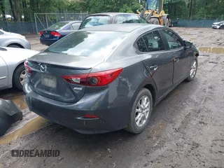 2014 Mazda 3 i Touring with VIN JM1BM1V72E1119890, listed as a IAAI auction lot 42531252 with 124,398 mi miles and . Bid and sale history available at DreamBid. Image 4.