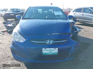 2015 Hyundai Accent GLS with VIN KMHCT4AE6FU916149, listed as a IAAI auction lot 41082268 with 153,219 mi miles. Bid and sale history available at carsss.com. Image 12.