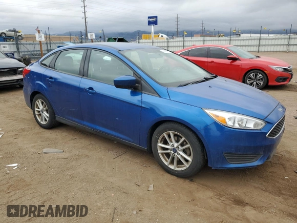 2018 Ford Focus SE with VIN 1FADP3FE4JL287169, listed as a Copart auction lot 53181935 with 134,656 mi miles and Clean Title. Bid and sale history available at carsss.com. Image 4.