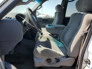 2001 Ford F-150 XLT with VIN 1FTRW07651KC49772, listed as a Copart auction lot 59904815 with 145,639 mi miles and Salvage title. Bid and sale history available at DreamBid. Image 7.