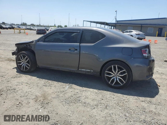 2015 Scion tC z VIN JTKJF5C76FJ010813, wystawiony jako Copart lot #58987575 z przebiegiem 108 709 mil mil oraz Szkoda całkowita • Salvage title. Historia ofert i sprzedaży dostępna na DreamBid. Obrazek 2.