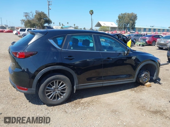 2020 Mazda CX-5 Sport with VIN JM3KFABM2L0761184, listed as a IAAI auction lot 41847768 with 47,582 mi miles. Bid and sale history available at carsss.com. Image 13.