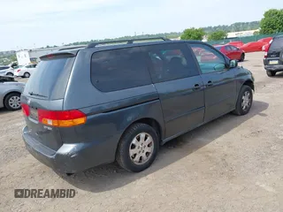 2004 Honda Odyssey EX-RES z VIN 5FNRL18824B138287, wystawiony jako IAAI lot #42245444 z przebiegiem 196 932 mil mil oraz . Historia ofert i sprzedaży dostępna na DreamBid. Obrazek 4.