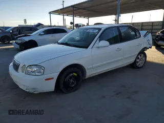 2003 Kia Optima LX z VIN KNAGD128335246024, wystawiony jako Copart lot #82228634 z przebiegiem 167 978 mil mil oraz Szkoda całkowita • Salvage title. Historia ofert i sprzedaży dostępna na DreamBid. Obrazek 1.
