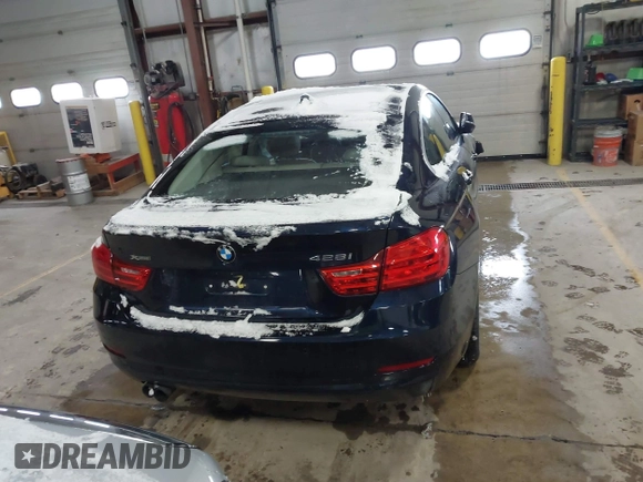 2015 BMW 4 Series 428i xDrive with VIN WBA4A7C57FD414955, listed as a IAAI auction lot 41609214 with 69,125 mi miles and . Bid and sale history available at DreamBid. Image 16.
