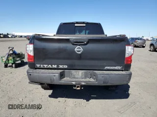 2017 Nissan Titan Pro-4X z VIN 1N6BA1F42HN530830, wystawiony jako Copart lot #63860384 z przebiegiem 317 812 mil mil oraz Szkoda całkowita • Salvage title. Historia ofert i sprzedaży dostępna na DreamBid. Obrazek 6.