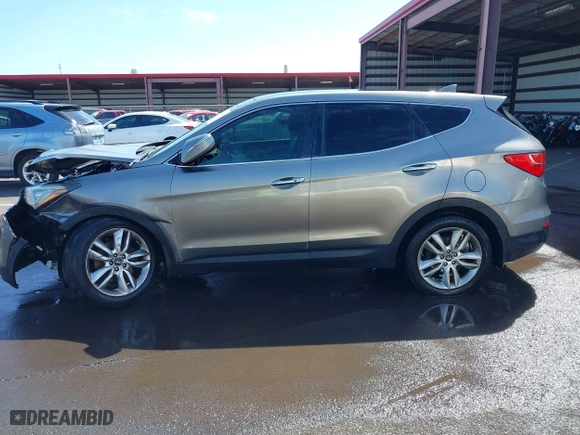 2013 Hyundai Santa Fe 2.0T Sport with VIN 5XYZWDLA9DG064393, listed as a IAAI auction lot 41601453 with 71,136 mi miles. Bid and sale history available at carsss.com. Image 14.