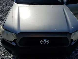 2014 Toyota Tacoma z VIN 5TFTX4CN1EX036611, wystawiony jako Copart lot #55146835 z przebiegiem 159 386 mil mil oraz Szkoda całkowita • Salvage title. Historia ofert i sprzedaży dostępna na DreamBid. Obrazek 11.