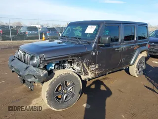 2018 Jeep Wrangler Unlimited Sport S with VIN 1C4HJXDN0JW255003, listed as a IAAI auction lot 41528394 with 55,660 mi miles and . Bid and sale history available at DreamBid. Image 18.