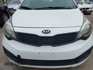 2014 Kia Rio LX with VIN KNADM4A3XE6384733, listed as a IAAI auction lot 42196921 with 153,084 mi miles and . Bid and sale history available at DreamBid. Image 6.